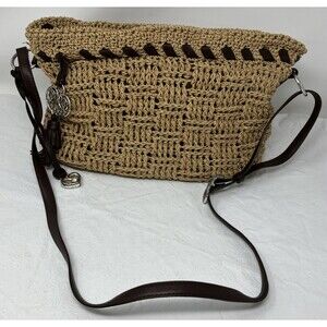 Brighton Carmel and Brown Woven Crossbody Bag
Signature charm,
Brown Strap